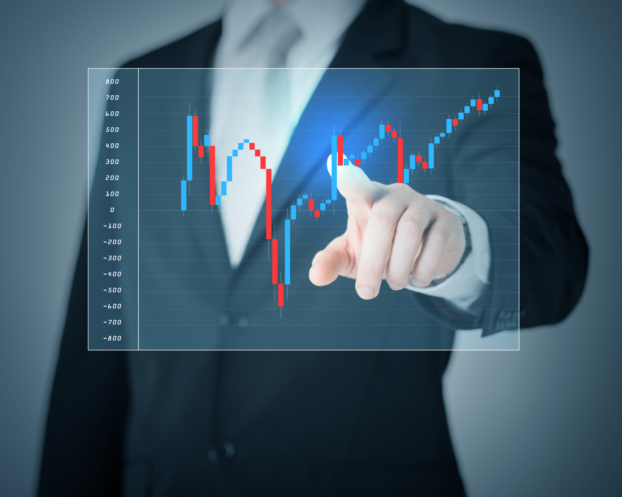 man hand pointing at forex chart